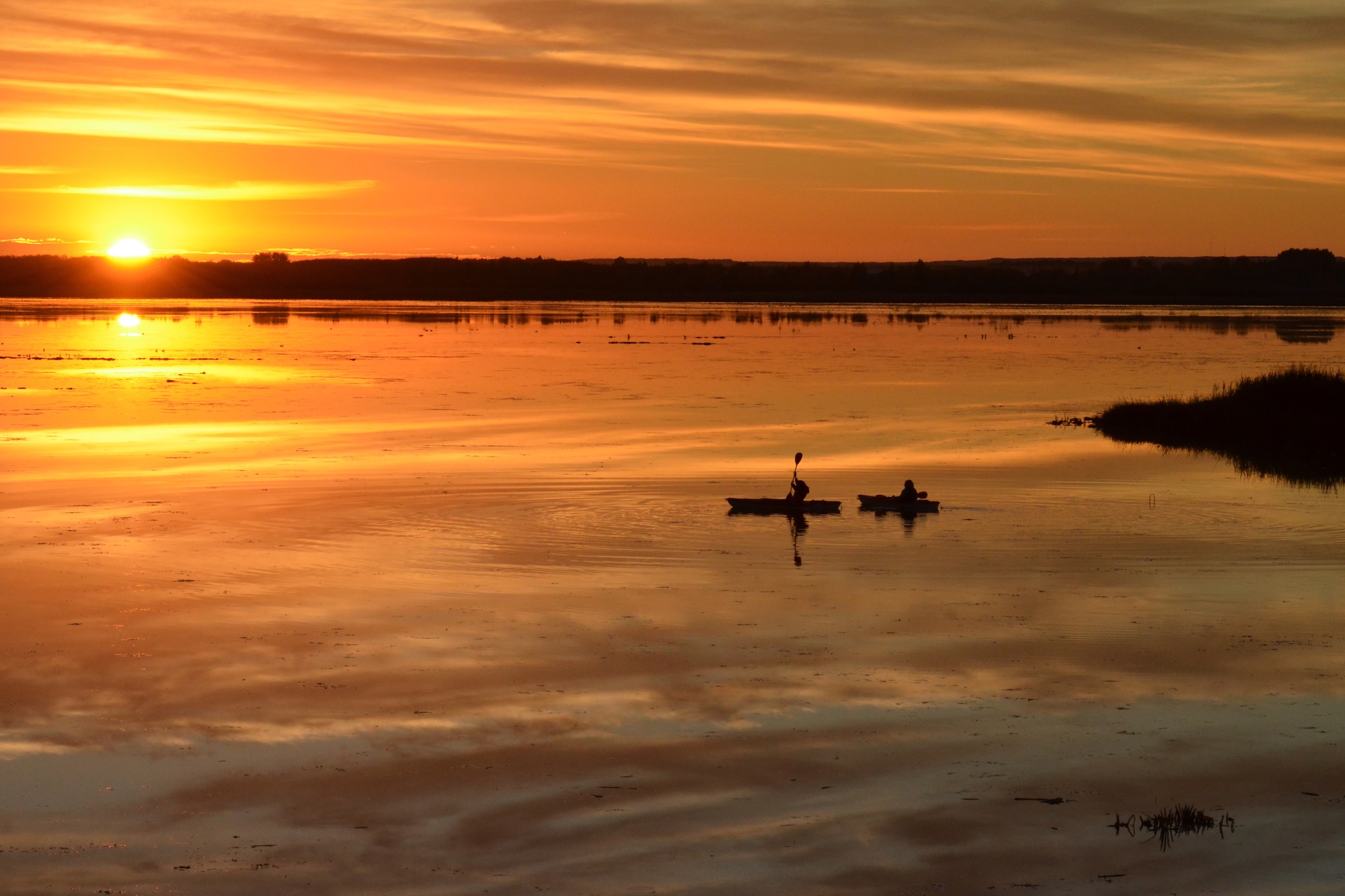 The aquatic reserve of Lois Hole Provincial Park on Big Lake, Alberta, provided this stunning sunset scene (lakes of Alberta).