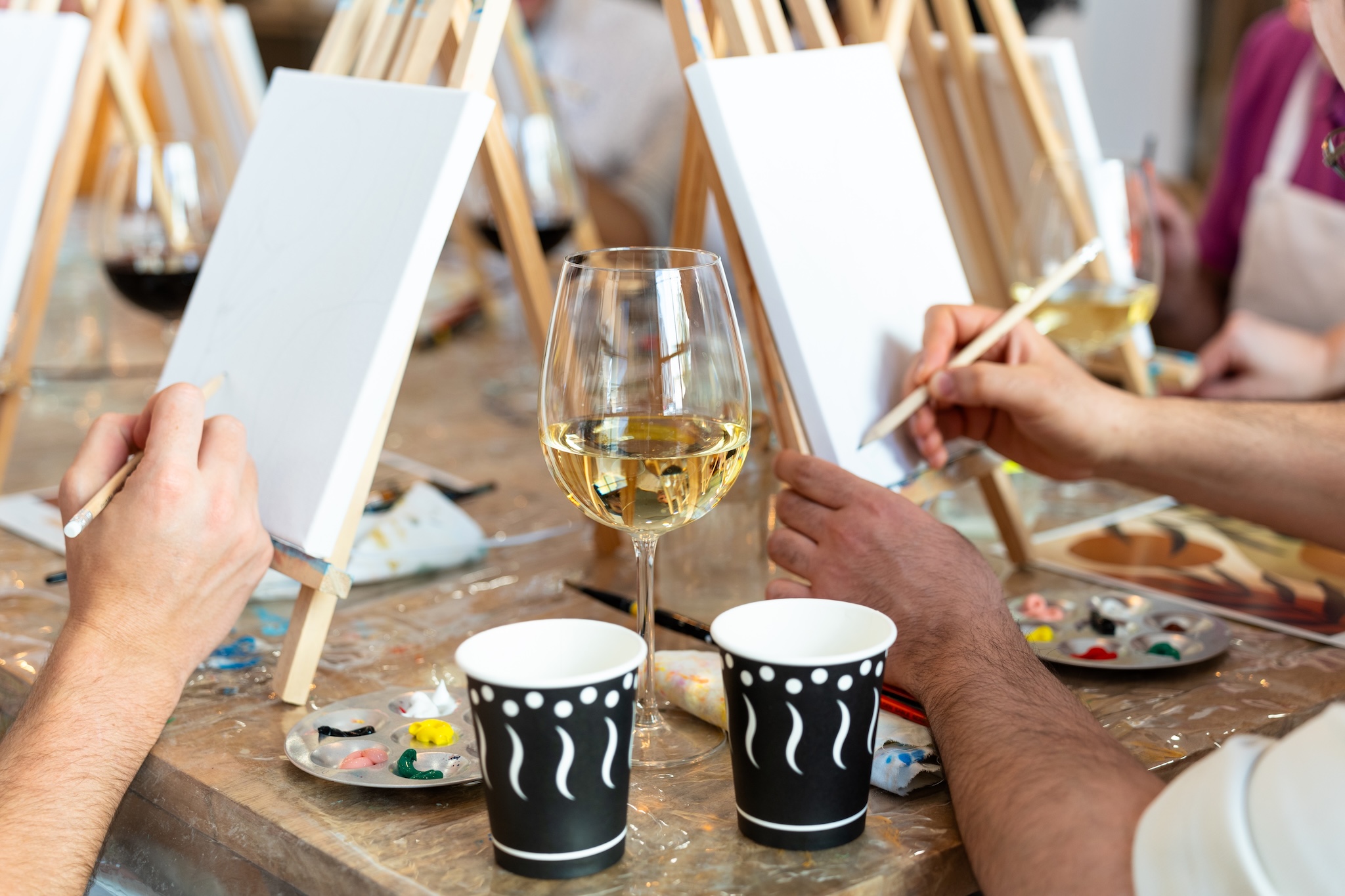 relaxing wine and painting night together